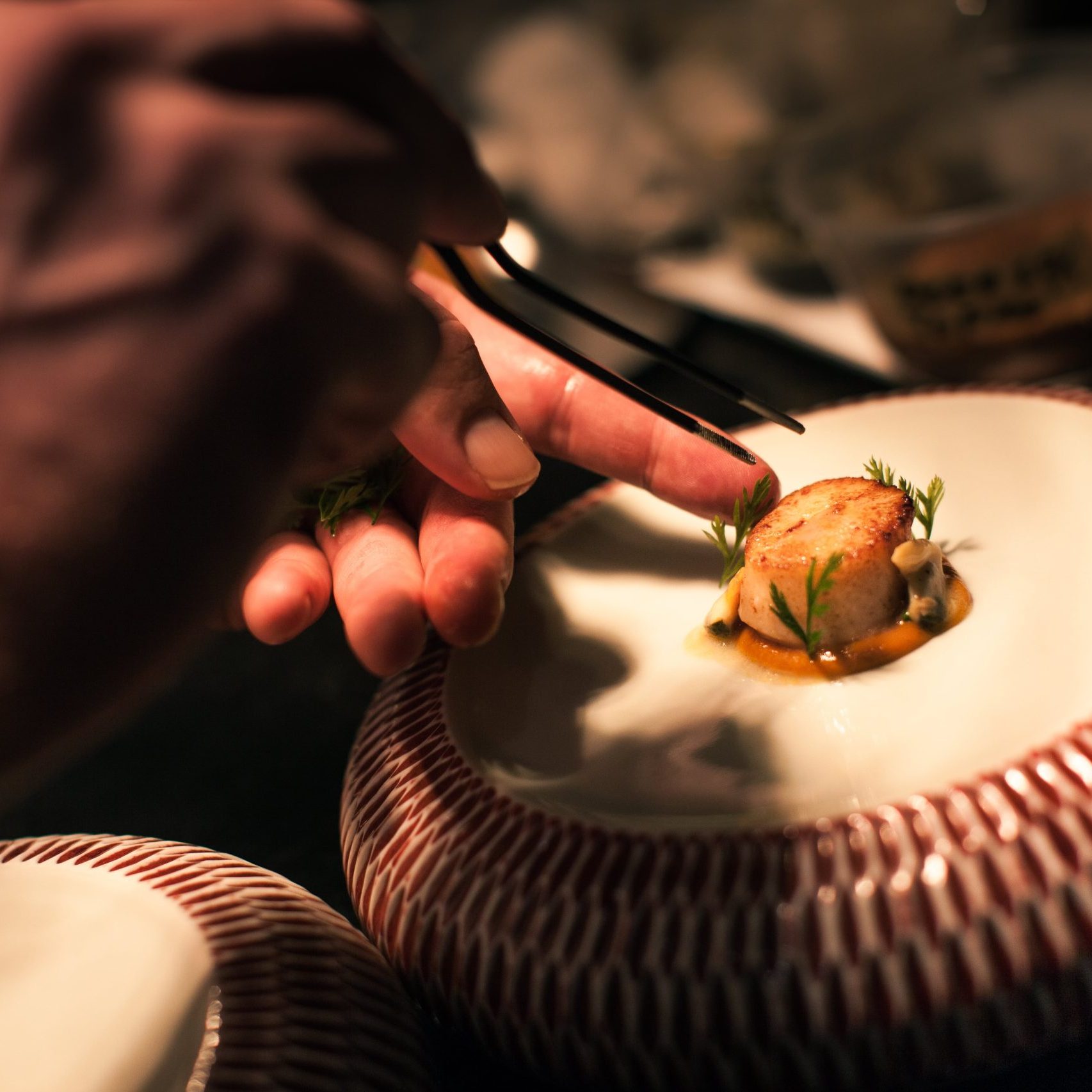 An elegantly plated scallop course