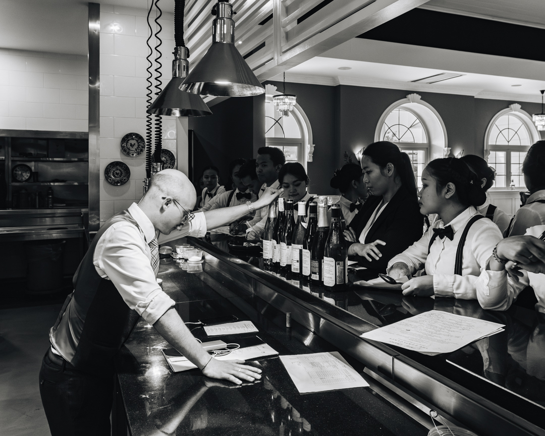 Staff standing in a fine-dining establishment in Bali