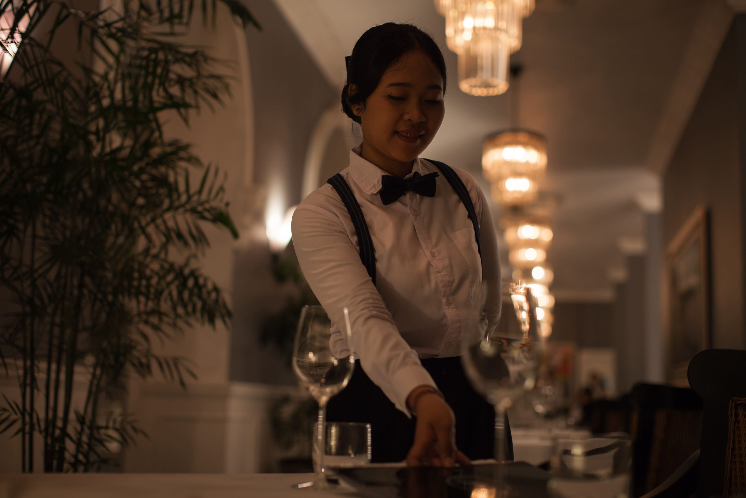 A staff at a restaurant in Indonesia