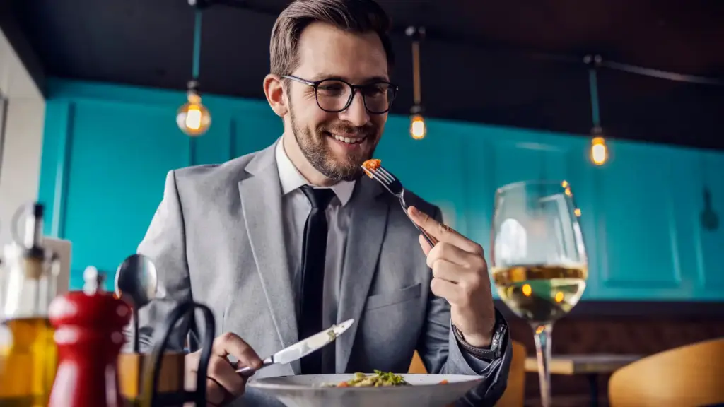 A customer eating at a Michelin star restaurant