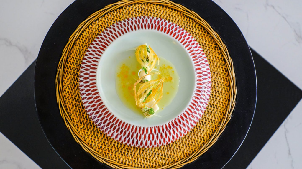 A fine dining dish that has been artfully plated and presented at Apéritif Restaurant, a fine dining restaurant in Ubud, Bali