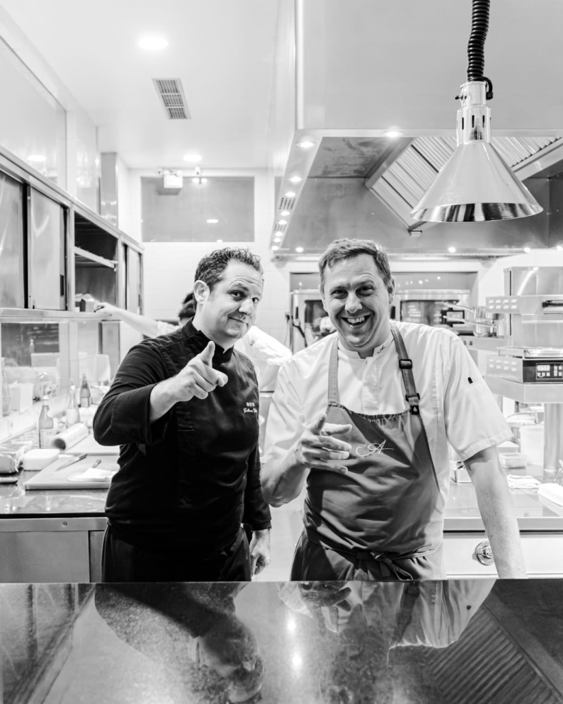 Chef Guillaume Galliot standing next to Chef Nic Vanderbeeken on Galliot's visit to Bali
