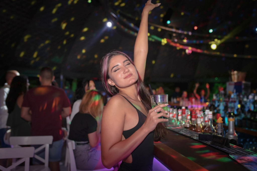 A woman enjoying the nightlife in Kuta